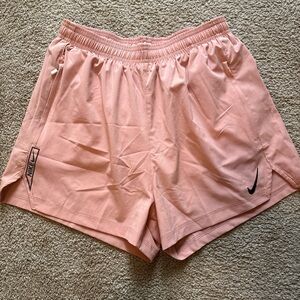 Nike Women's Light Pink Athletic Shorts